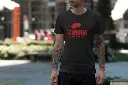 Boucherie_Jambier_tee-mockup-featuring-a-man-with-tattooed-arms-on-the-street-3362-el1.webp