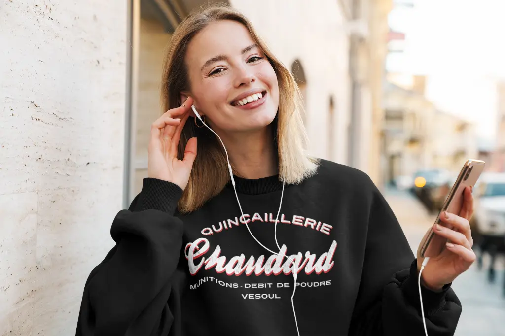 mockup-of-a-happy-woman-with-a-sweatshirt-putting-headphones-on-39825-r-el2.webp